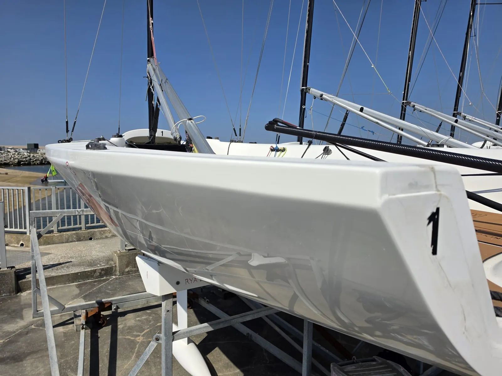 Racing keelboat topside after gunwale repair, finished to a full gloss