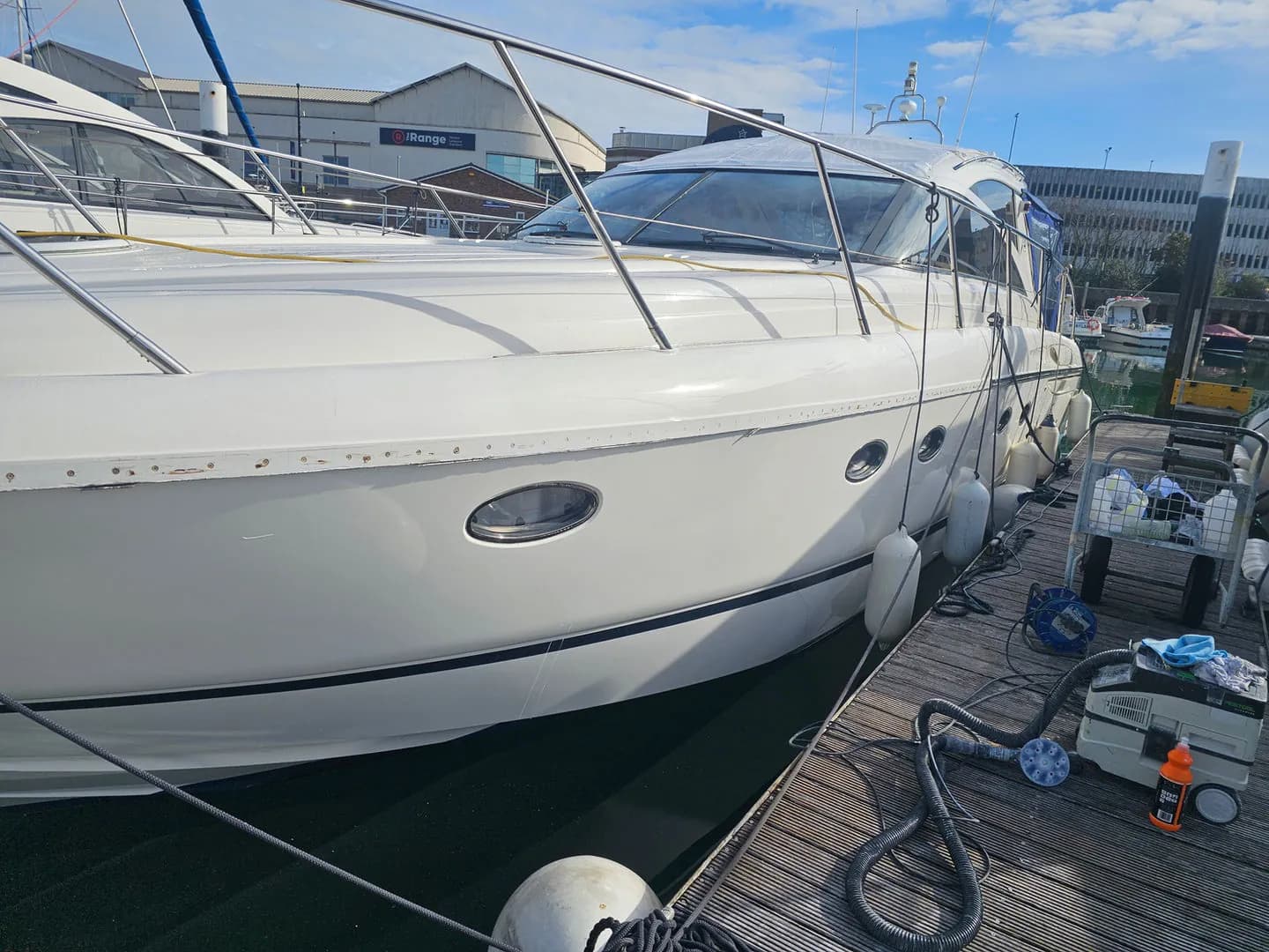 Princess yacht hull after colour-matched gelcoat repair, polished and blended