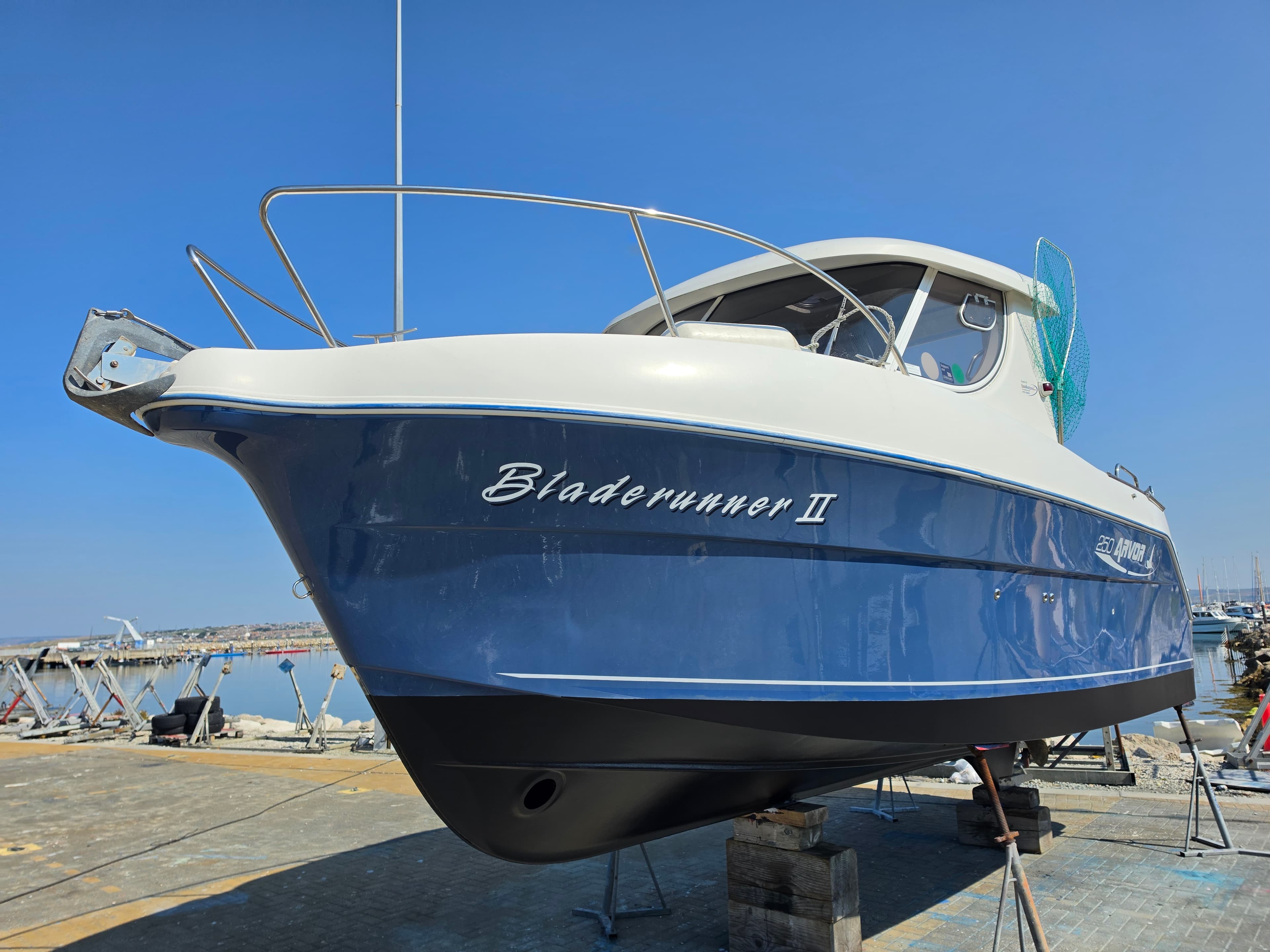 Blue hull wet sand, polish & wax. Antifoul preparation & application